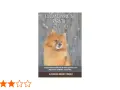 Un adorable perro pomerania, protagonista de "La Guía Completa para tu Pomerania", posa con su pelaje esponjoso.